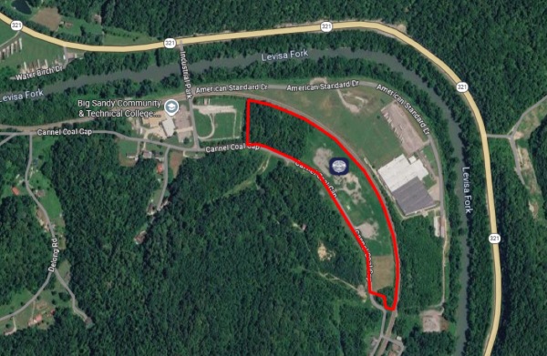 high altitude image of Hager Hill site, outlined in red, showing its proximity to the highway and general location